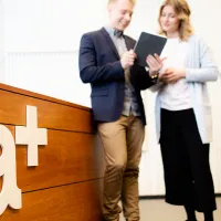 man and woman ipad